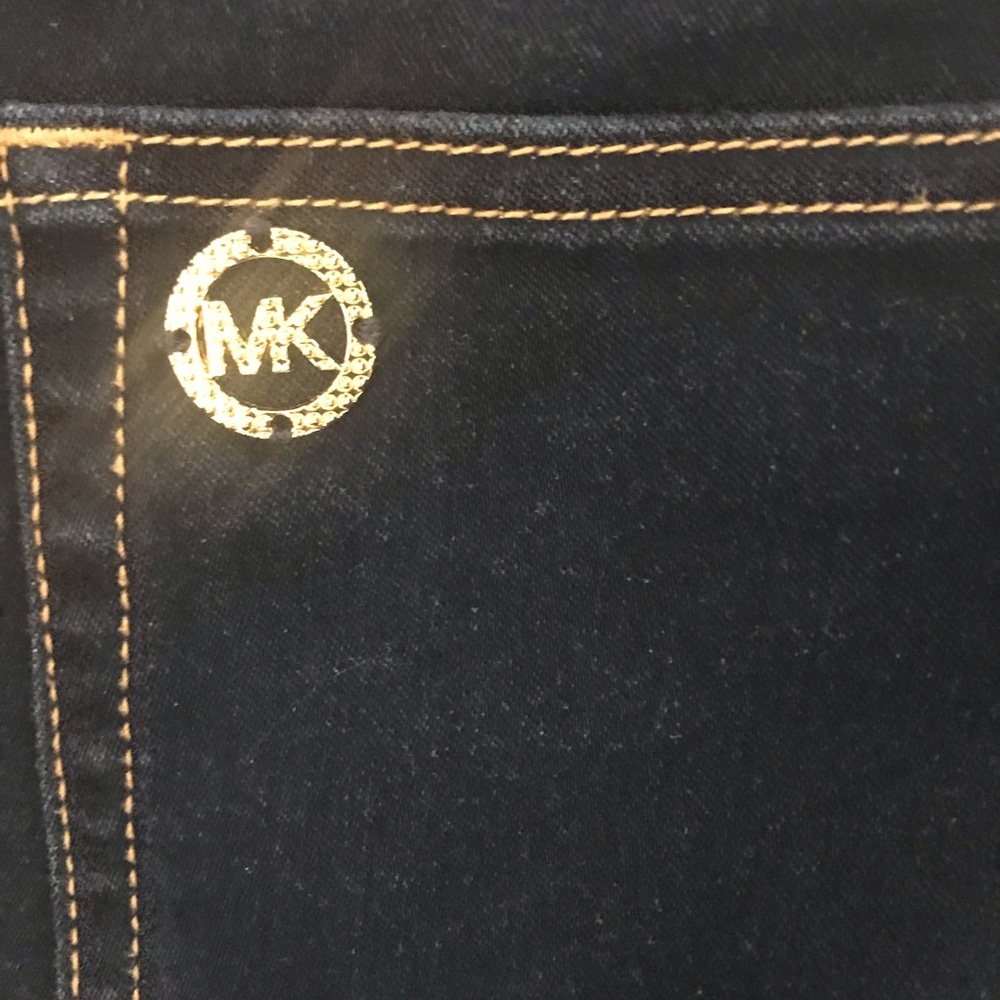 Michael Kors flare leg stretch dark denim. Size 12. Excellent shape.